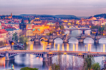 Prague, Czech Republic: romantic bridges that crosses Vltava river in the sunset