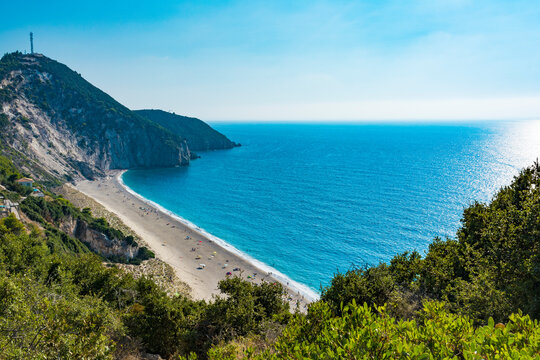 Lefkada island, Mylos beach, Greece - August 30 2016: The sand is pure white and the waters are turquoise. The beach is at the end of the scenic footpath setting out from Aghios Nikitas.