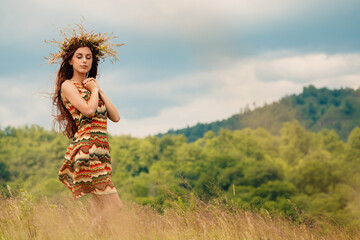 Obraz premium Woman walking in field. Russia. Teploozersk village