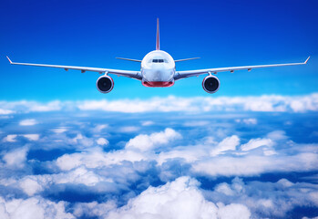 Fototapeta na wymiar passenger airliner in the clouds