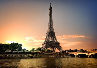Fototapeta na wymiar Eiffel tower and river Seine at summer evening in Paris, France