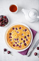 Cherry frangipane cake in a plate