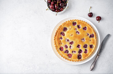 Cherry frangipane cake in a plate