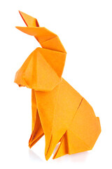 Orange easter bunny of origami, isolated on white background