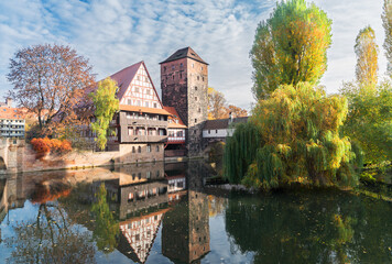 Fototapeta na wymiar Old town of Nuremberg with half-timbered houses over Pegnitz river, Germany