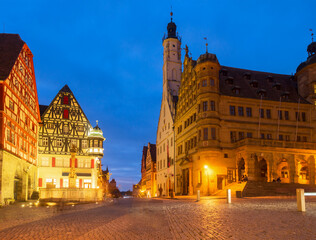 Naklejka na ściany i meble Market square with city hall in Rothenburg ob der Tauber at night, Germany
