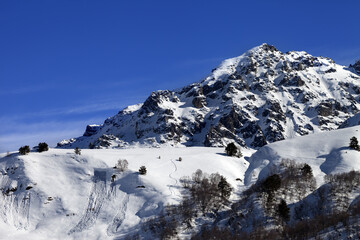 Naklejka premium Off-piste slope with track from avalanche on sunny day. Caucasus Mountains, Tetnuldi, Svaneti region of Georgia.