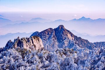 Winter sunrise landscape in Huangshan National park. Park located in Anhui province in China. It is...