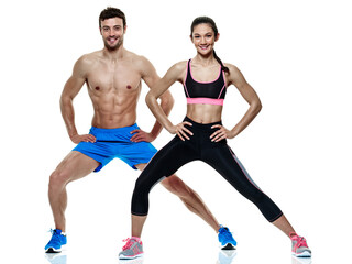 one caucasian couple man and woman exercising fitness exercises isolated on white background