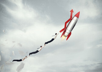 Businessmen flying attached to a missile with an arrow. take-off business success concept  . 3D...