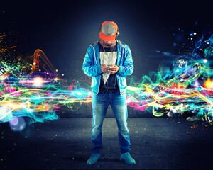 Boy listening to hiphop music with lights effects