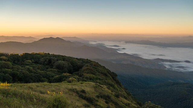 Tropical forest nature landscape with mountain range and moving cloud mist time lapse at Kew Mae Pan nature trail, Doi Inthanon, Chiang Mai Thailand 4K timelapse