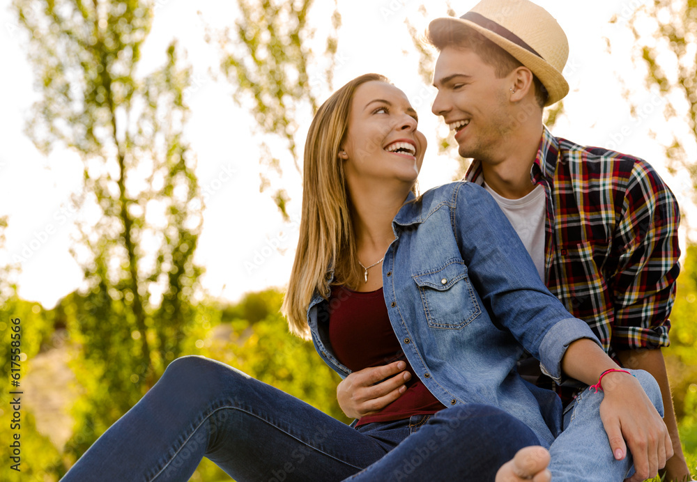 Canvas Prints portrait of a happy young couple enjoying a day in the park together