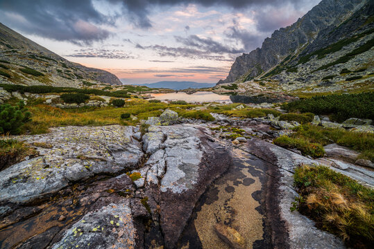 Mountain Landscape with a Tarn and Creek in the Evening. Mlynicka Valley, High Tatra, Slovakia.