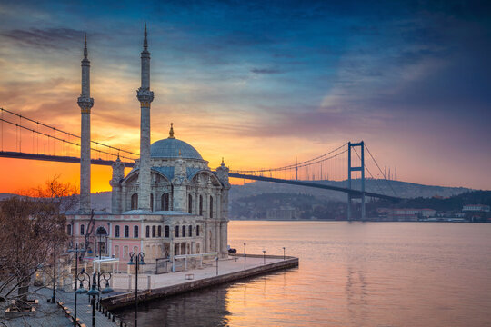 Image of Ortakoy Mosque with Bosphorus Bridge in Istanbul during beautiful sunrise.