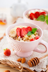Healthy Breakfast with oatmeal and fresh strawberry.