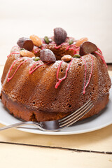 fresh chestnut cake bread dessert with almonds and pistachios on top