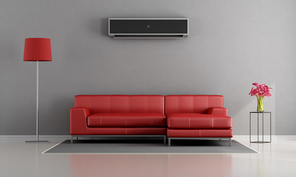 Living room with red sofa and air conditioner - 3d rendering