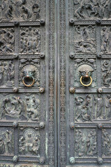 Ancient medieval metal door of Bremen Cathedral, Germany.