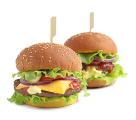 Delicious burgers with beef patty and lettuce isolated on white