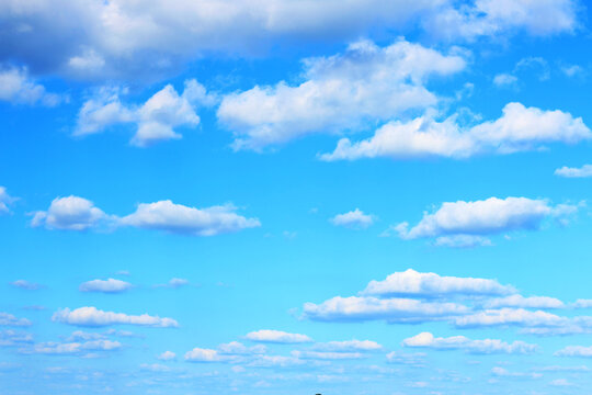Beautiful blue gradient sky with many clouds. Nature wallpaper background