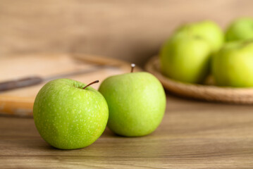 Green apple fruit on wooden background, Healthy fruit