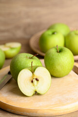 Green apple fruit on cutting wooden board, Healthy fruit