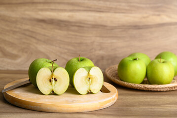 Green apple fruit on cutting wooden board, Healthy fruit