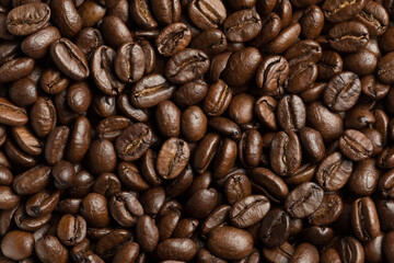 Abstract roasted coffee beans background. Macro photo