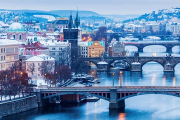 Poster Winter in Prague - bridges on Vltava River. Prague, Bohemia, Czech Republic. © Designpics