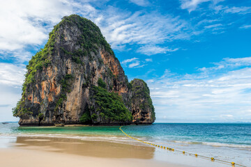Fototapeta na wymiar Beautiful scenic rock in the Andaman Sea off the coast of Thailand
