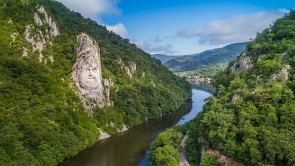 Decebal Head sculpted in rock. Danube Gorges (Cazanele Dunarii) Romania. - obrazy, fototapety, plakaty