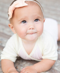 Baby girl outside. Selective focus on her eyes.