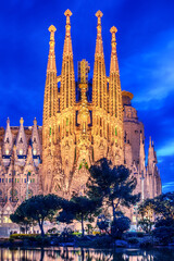 Barcelona, Catalonia, Spain: Basicila and Expiatory Church of the Holy Family, known as Sagrada Familia at sunset