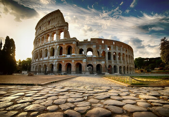 Fototapeta na wymiar Cloudy dawn over roman Colosseum in Italy