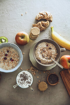 Healthy breakfast variety. Cereals with fruit. Yogurt with seeds