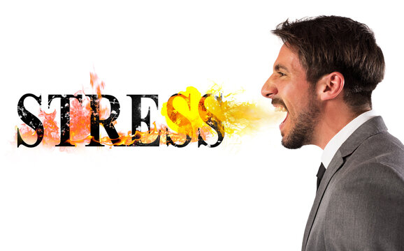 Businessman burns the word stress. stressed business life concept