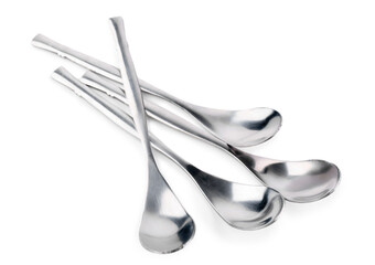 Stainless steel spoons on white background