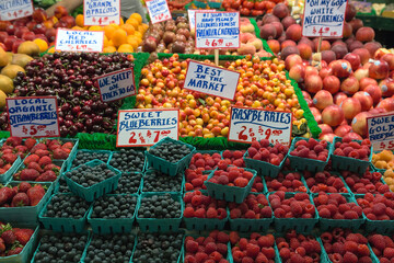 Fresh fruits Nectarines Cherry Strawberry Blueberry Rashberry Apricot in public market fruit stall