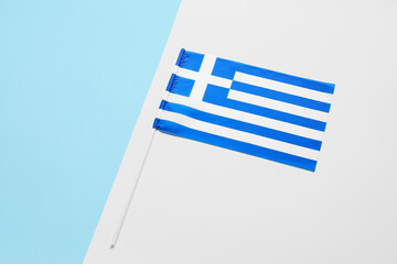 Obraz premium Flag of Greece on white and blue background
