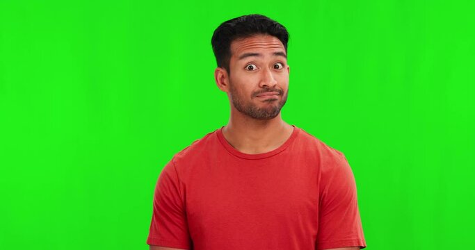 Confused, doubt and question with a man on a green screen background in studio for problem solving or uncertainty. Portrait, why and asking with a young male person looking unsure on chromakey mockup