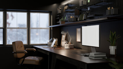 Interior design of a modern dark loft home office with computer mockup on a dark wooden table