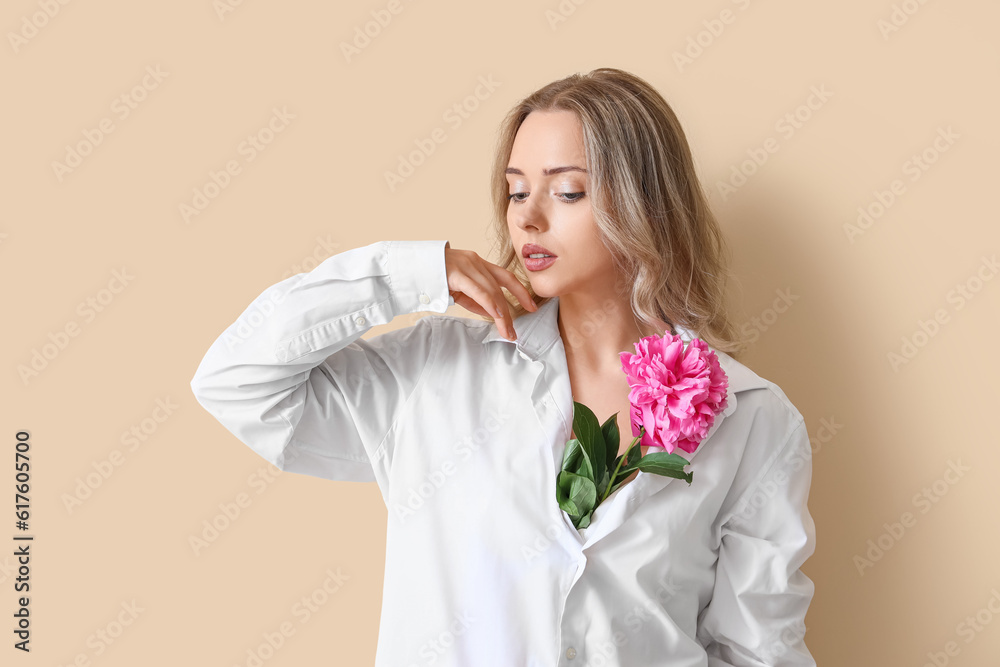 Sticker young woman with beautiful peony flower on beige background