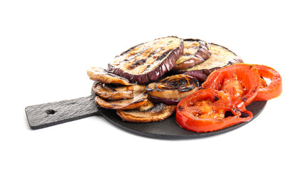 Slate board with different tasty grilled vegetables on white background