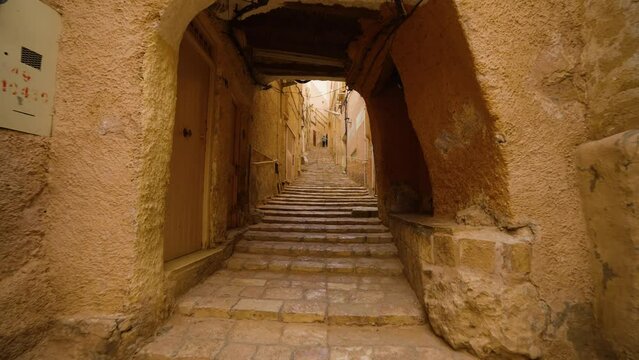 Passageways On The Medieval Streets In The Old Town Of Ghardaia In Algeria. Dolly Shot