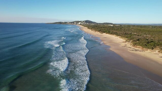 Ocean Waves Rolling To The Sandy Coolum Beach Along The Foreshore Park In Queensland, Australia. - aerial