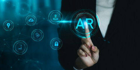 Business woman pointing on AR blue neon icon. Augmented reality technology. Futuristic Technology...