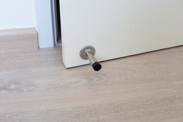 White door with door stopper