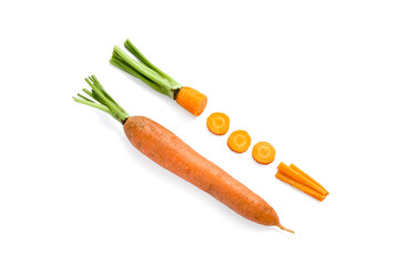 Fresh carrot and slices on white background