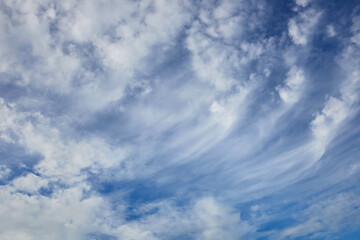  Low angle view of blue sky with fluffy clouds